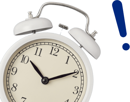 Reloj despertador con un signo de exclamación